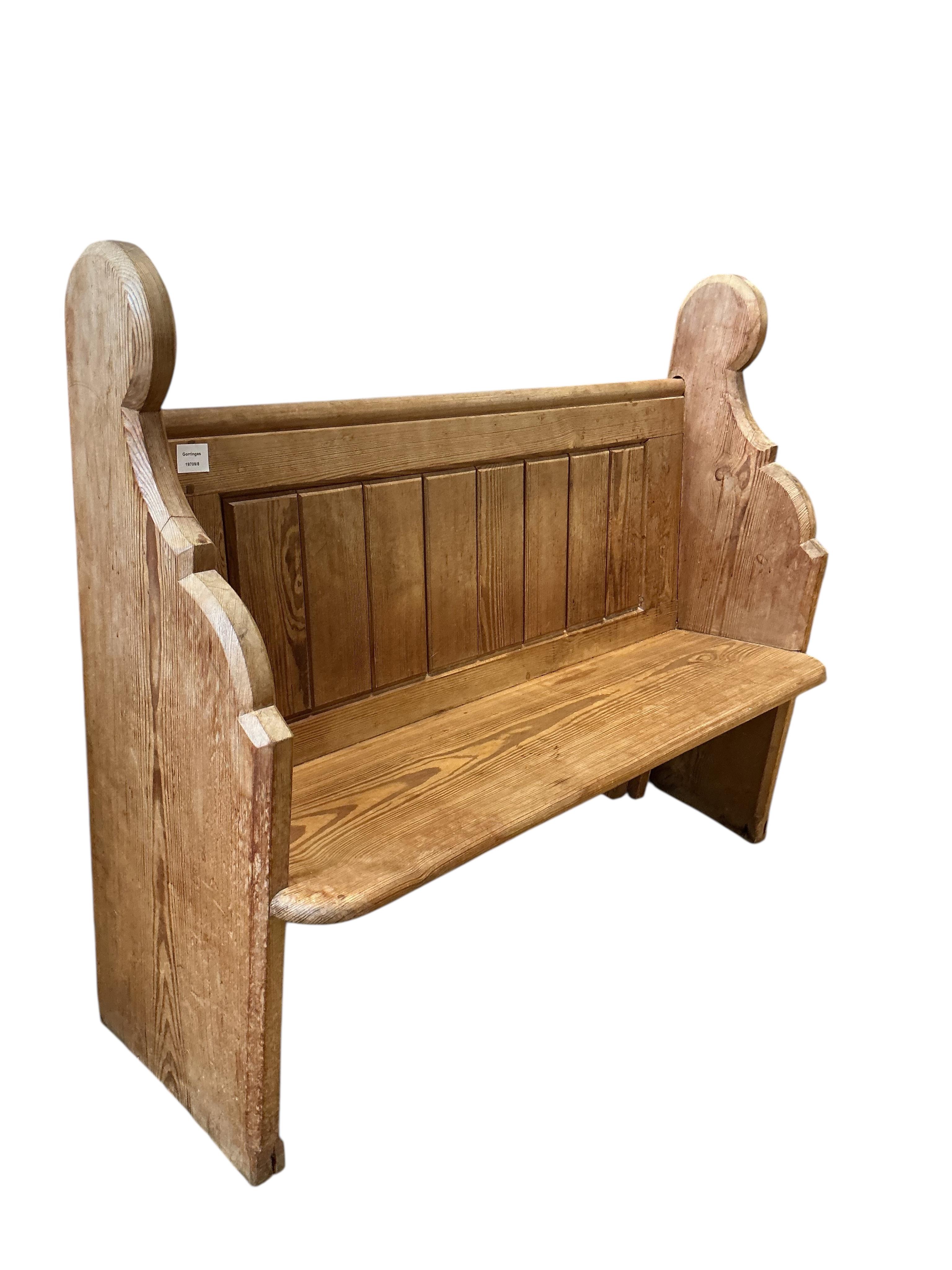 A small Victorian panelled pitch pine pew, width 119cm, depth 40cm, height 99cm